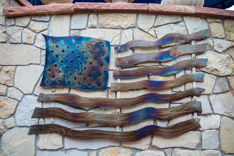 Pueblo, Colorado - An American flag made from steel outside the Center for American Values. The Center displays photographs of 140 Congressional Medal of Honor recipients. It is affiliated with the America First Policy Institute, which is closely aligned with President-elect Donald Trump.