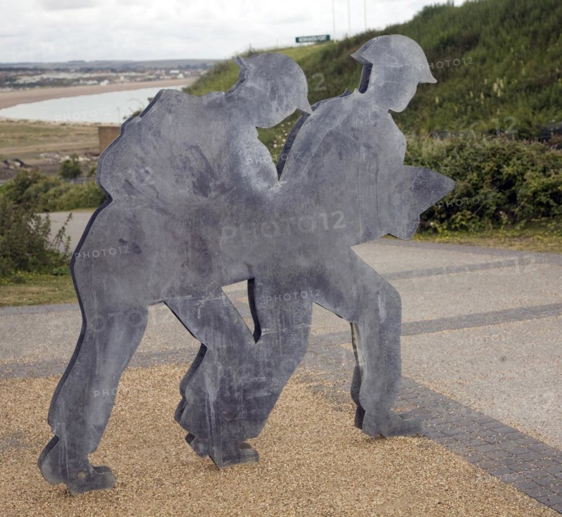 Figures of soldiers carrying ammunition, Newhaven Fort, East Sussex, England, United Kingdom, Europe