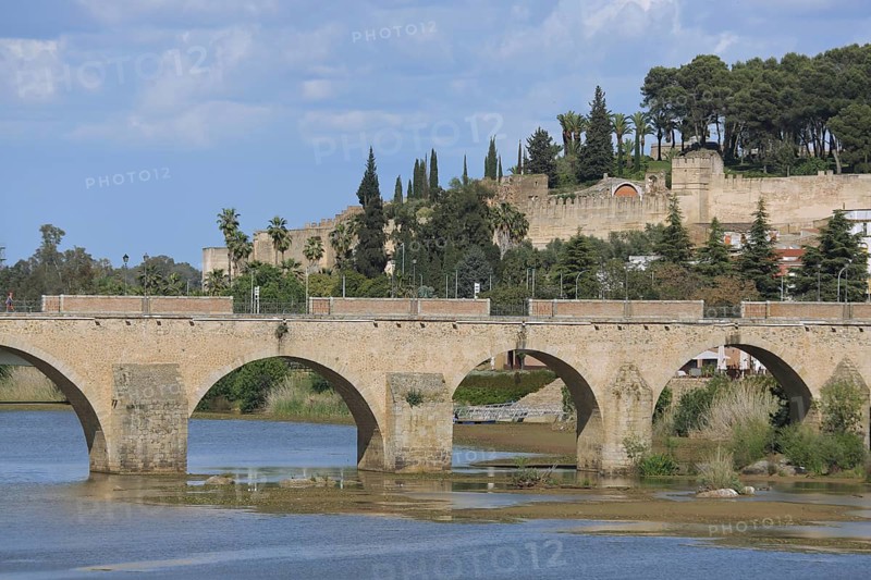 Historical bridge Puente de Palmas built in the 15th century over the river Rio Guadiana and city fortification Alcazaba, Badajoz, Extremadura, Spain, Europe