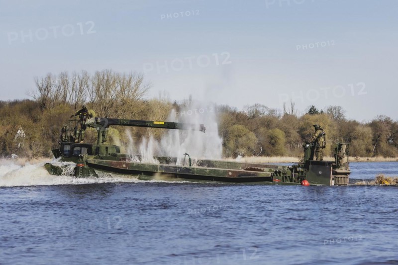 The Bundeswehr's M3 amphibious vehicle forms up in the Elbe as part of the 'Wettiner Schwert' military exercise with German and Czech soldiers near Tangermünde, 26 March 2024. 'Wettiner Schwert' is part of the NATO Quadriga exercise