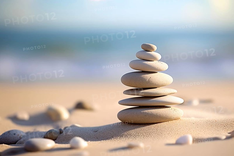 Zen stones stack on sand waves in a minimalist setting for balance and harmony. Balance, harmony, and peace of mind, wellness, meditation, and spirituality concept, AI generated