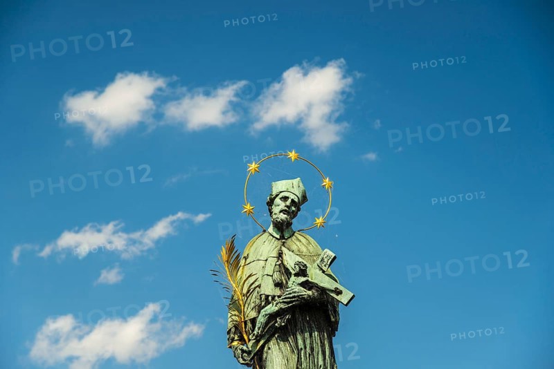 Statue of St John of Nepomuk, Charles Bridge on the Vltava River, UNESCO World Heritage Site, Prague, Czech Republic, Europe