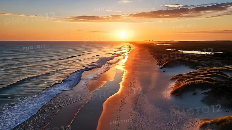Aerial view of Sunset mood on a whispering tranquil costal landscape with sandy beach, AI generated