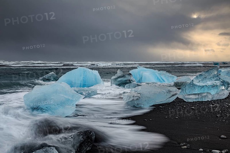 Ice floes on the beach, waves, sea, clouds, sunlight, winter, Diamond Beach, Breidamerkursandur, Jökulsarlon, Iceland, Europe