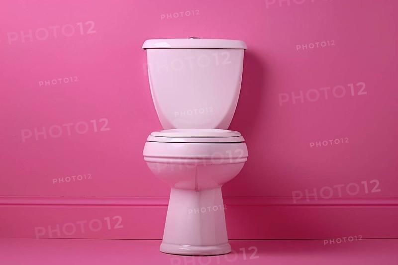 White ceramic toilet in front of pink wall. Generative AI, AI generated