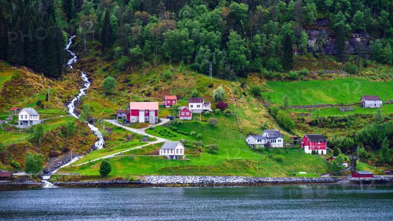 Mountains and Fiord over Norwegian Village in Olden, Innvikfjorden, Norway, Europe