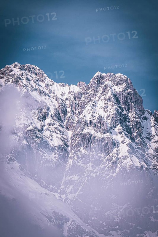 Majestic, snow-covered mountain peaks under a blue sky create a frosty atmosphere, Kaisergebierge, The Mountain Doctor, Elmau, Austria, Europe