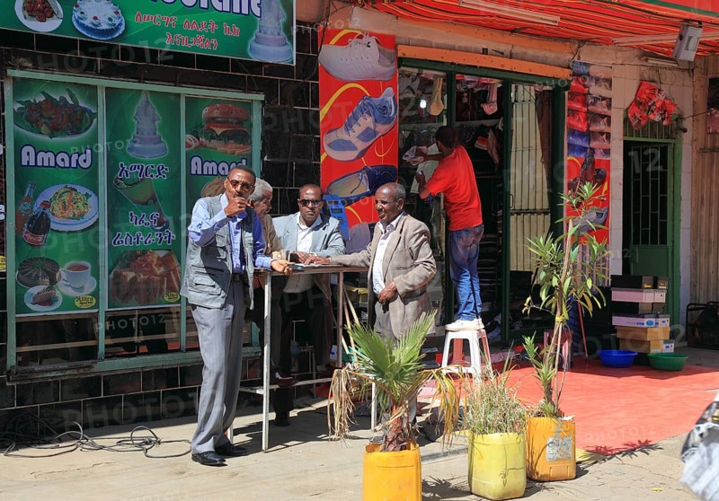 Addis Ababa, in the city centre, locals in front of a snack bar, Ethiopia, Africa