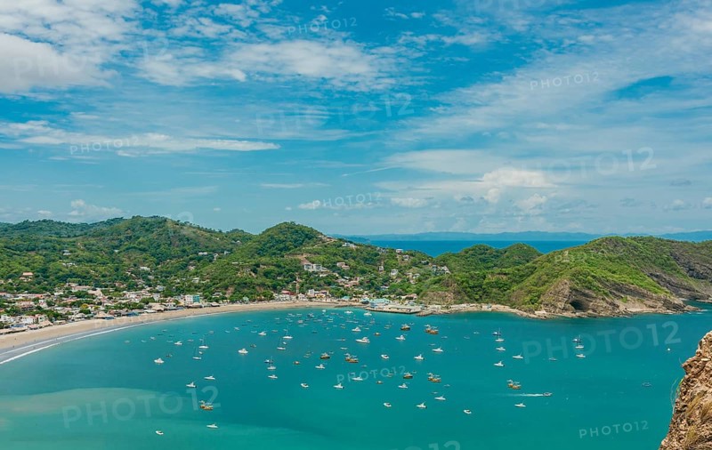 San Juan del Sur bay with ships and boats on the shore. Boats on the shore of the bay of San Juan del Sur