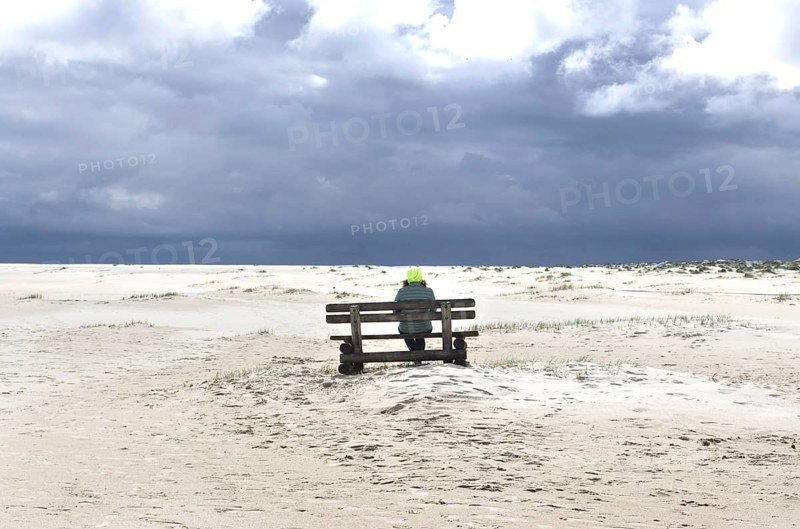 Woman with yellow cap on the beach of Wittdün, Amrum Island, 25.05.2021