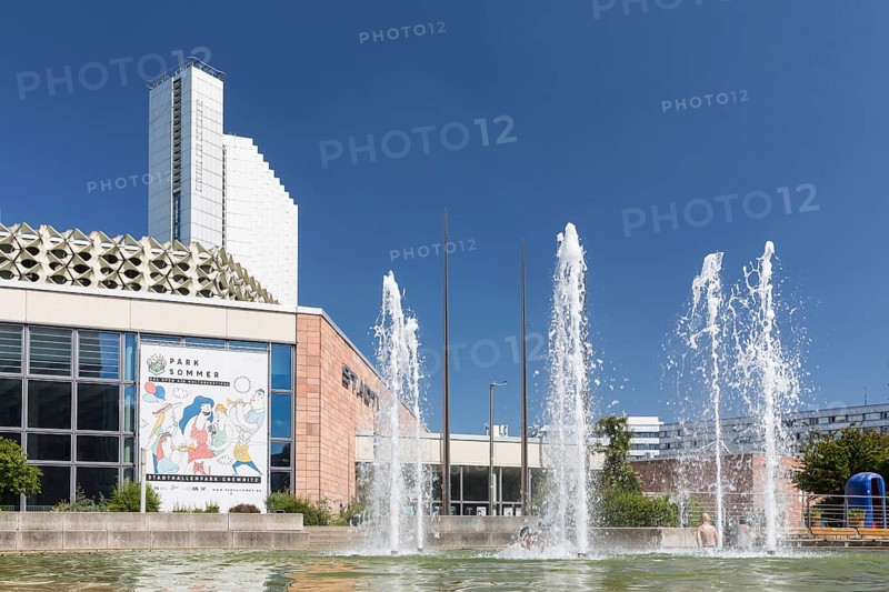 Water features at the civic hall, fountain in front of the typical façade design of the Ostmodernen, Chemnitz, Saxony, Germany, Europe