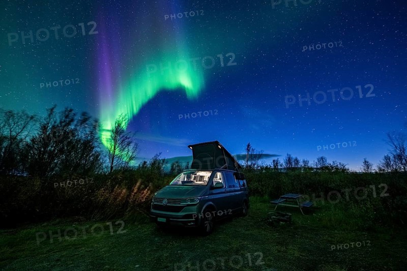 Northern lights over camper, VW California, Lyngen, Troms og Finnmark, Norway, Europe