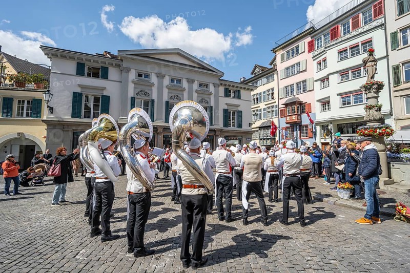 Historically costumed guildsmen in Zurich's Old Town, stand concert at Münzplatz, Zunft zum Weggen, Sechseläuten or Sächsilüüte, Zurich Spring Festival, Zurich, Switzerland, Europe