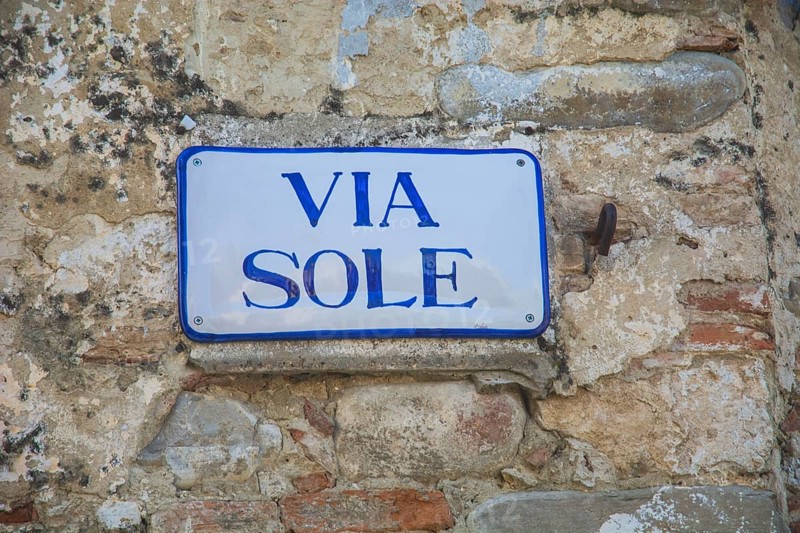 Street sign on a wall in Aliano, the very poor village in southern Italy that the writer Carlo Levi described in his book Christ stopped at Eboli. The book became a bestseller and was filmed. Aliano, Matera District, Basilicata, Italy, Southern Europe, Europe