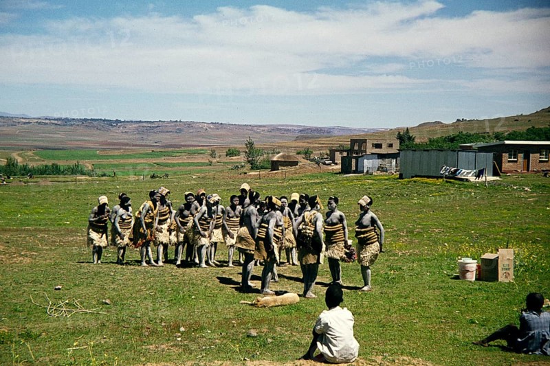 Subtitle: Basuto Dancers South Africa 1979 Group of women in traditional costume practise their dance in a rural setting