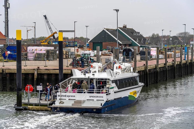 Fast ferry, WattnExpress, from Neuharlingersiel, to the island of Spiekeroog, here in the harbour of Spiekeroog, Lower Saxony, Germany, Europe