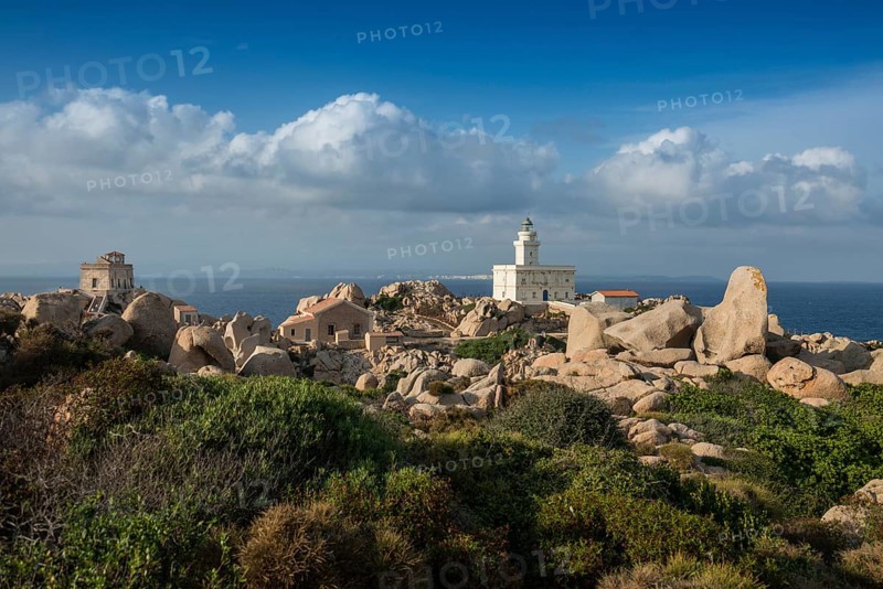 Lighthouse and huge granite rocks by the sea, Capo Testa, near Santa Teresa di Gallura, Sardinia, Italy, Europe