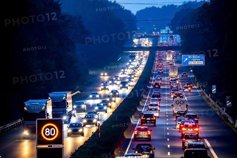 Motorway A40, Ruhrschnellweg, near Bochum, heavy evening traffic, in front of the motorway junction Bochum, A43, view in west direction