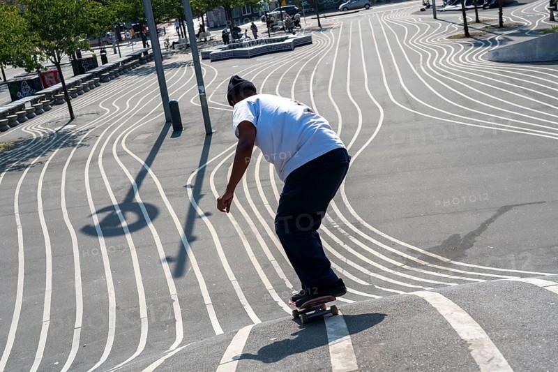 The Nørrebro district in Copenhagen, lively, multicultural and student neighbourhood, Superkilen Park, Den Sorte Plads, square designed with white lines, playgrounds, cultural facilities, sports equipment, cycle path, Denmark, Europe