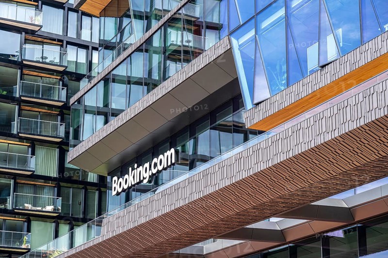 New corporate headquarters of Booking.com, online travel agency, hotel broker, building at Oosterdokseiland in the city centre of Amsterdam, Netherlands