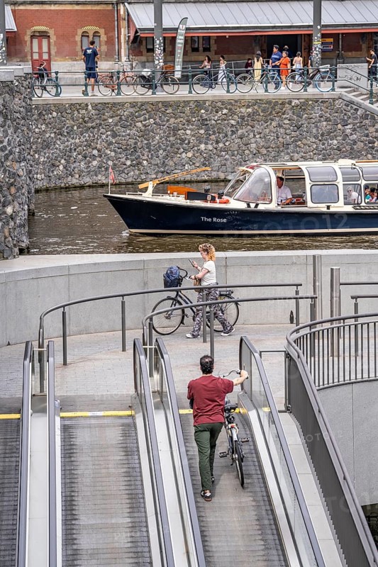 New bicycle car park at Amsterdam Central Station, Stationsplein, space for around 7000 bicycles, largest in Amsterdam, digitally monitored, underground, direct connection to the station and metro, Netherlands, escalators lead to the bicycle garage, Netherlands