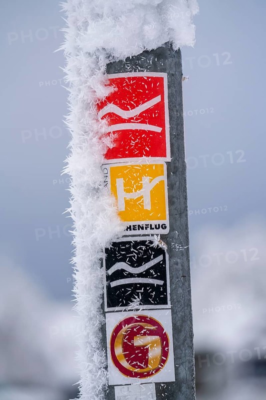 Signposts, hiking signs, winter in the Sauerland, Hochsauerlandkreis, at Kahler Asten, near Winterberg, few tourists, visitors, during the lockdown in January 2021, North Rhine-Westphalia, Germany, Europe