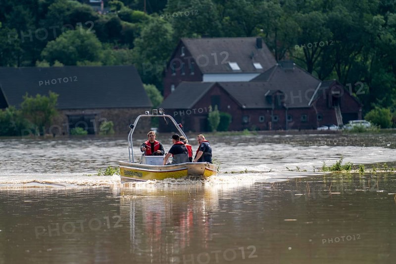 High water on the Ruhr, after long heavy rainfall the river came out of its bed and flooded the countryside and villages, the highest water level ever measured, over 20 people were rescued from flooded houses by the fire brigade and DLRG in Bochum Dahlhausen, Bochum, North Rhine-Westphalia, Germany, Europe