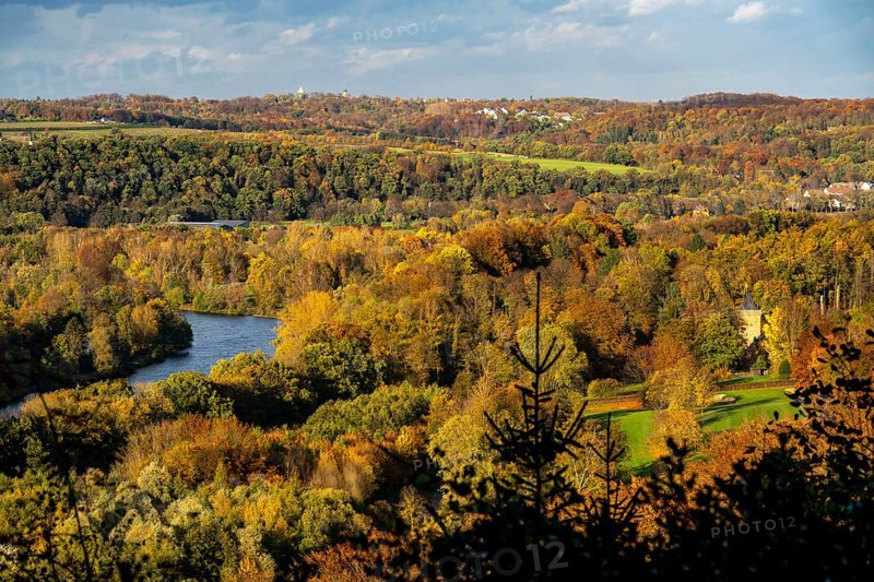 Autumnal forest along the Ruhr valley between Essen-Kettwig and Essen-Werden, seen from Öfter Wald, on the right golf course Schloss Oefte, Essen, North Rhine-Westphalia, Germany, Europe