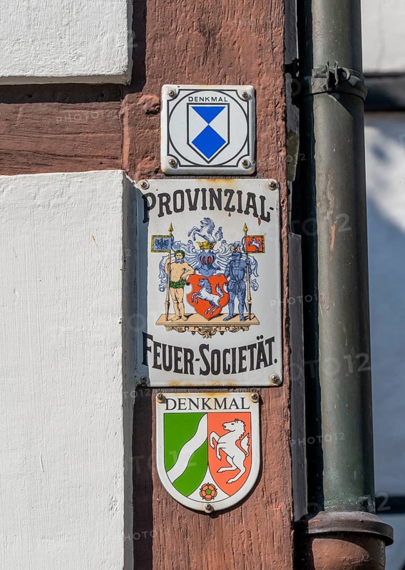 Old village of Westerholt, listed district of Herten Westerholt, over 60 old, well-renovated half-timbered houses form a historic village centre, Herten, listed buildings badge, North Rhine-Westphalia, Germany, Europe