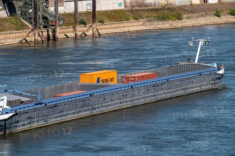 Rhine at Duisburg, extremely low water, Rhine level at 168 cm, falling, cargo ships are only allowed to sail slowly with very limited cargo, container freighters with few containers, North Rhine-Westphalia, Germany, Europe