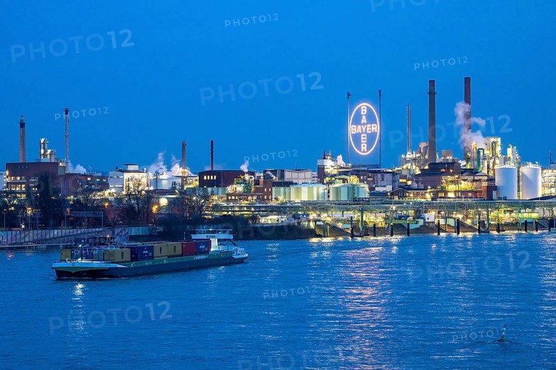 Backdrop of Chempark Leverkusen, Bayer Leverkusen, chemical park, chemical plant, river Rhine, cargo ship, Leverkusen, North Rhine-Westphalia, Germany, Europe