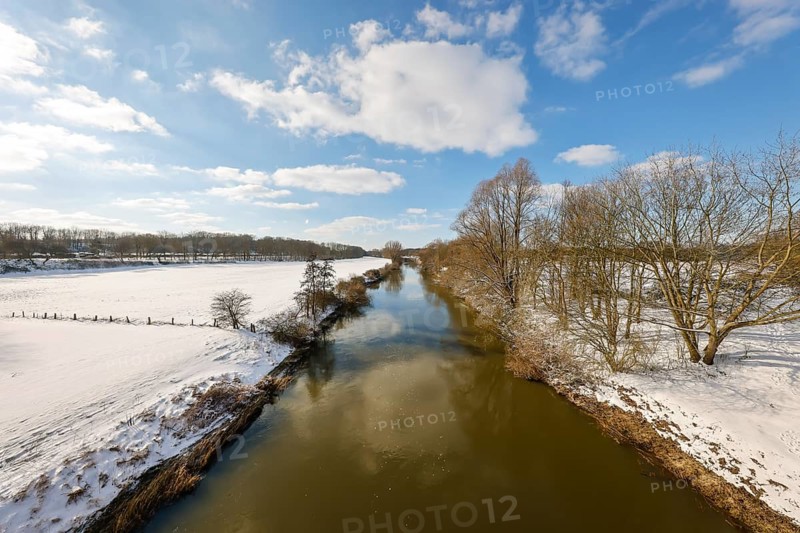Schermbeck, North Rhine-Westphalia, Germany - Sunny winter landscape in the Ruhr area, ice and snow on the river Lippe