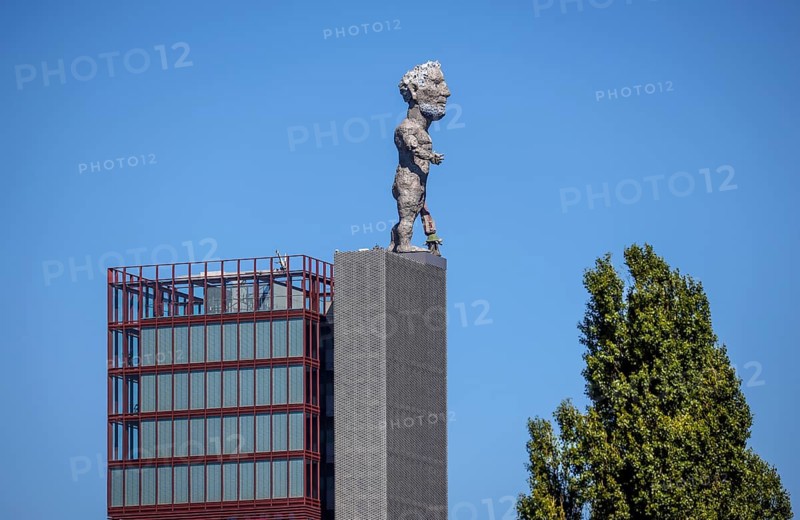 30.07.2022, Gelsenkirchen, North Rhine-Westphalia, Germany, Nordsternpark, here the Nordstern colliery tower with the HERKULES VON GELSENKIRCHEN, an 18 metre high monumental sculpture by the German artist Markus Lüpertz. Parks and gardens in the Ruhr region. Nordsternpark is a landscaped park on the site of the former Nordstern colliery in Gelsenkirchen. Following the closure of the Nordstern colliery in 1993, the site was completely renovated and transformed into a landscape park. The Federal Garden Show was held in the park in 1997. The site will be further redesigned as part of the IGA 2027. 00X220730D040CARO (MODEL RELEASE: NO, PROPERTY RELEASE: NO (c) caro images / Rupert Oberhaeuser, http://www.caro-images.com, info@caro-images.com, If the photo is used for purposes other than journalism, please contact the agency, Any use of the photo is subject to a fee !), Europe