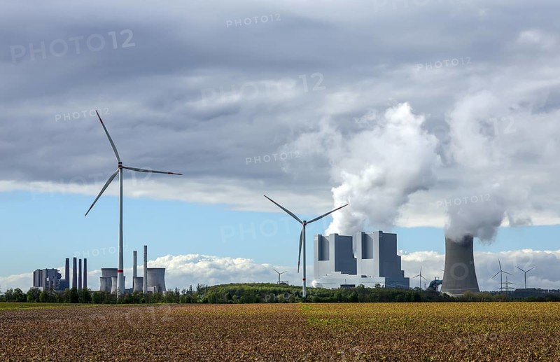 Grevenbroich, North Rhine-Westphalia, Germany, RWE Power AG Neurath power plant, lignite-fired power plant at RWE's Garzweiler opencast lignite mine, on the right the new power plant units F and G. Wind turbines in the wind farm, Europe