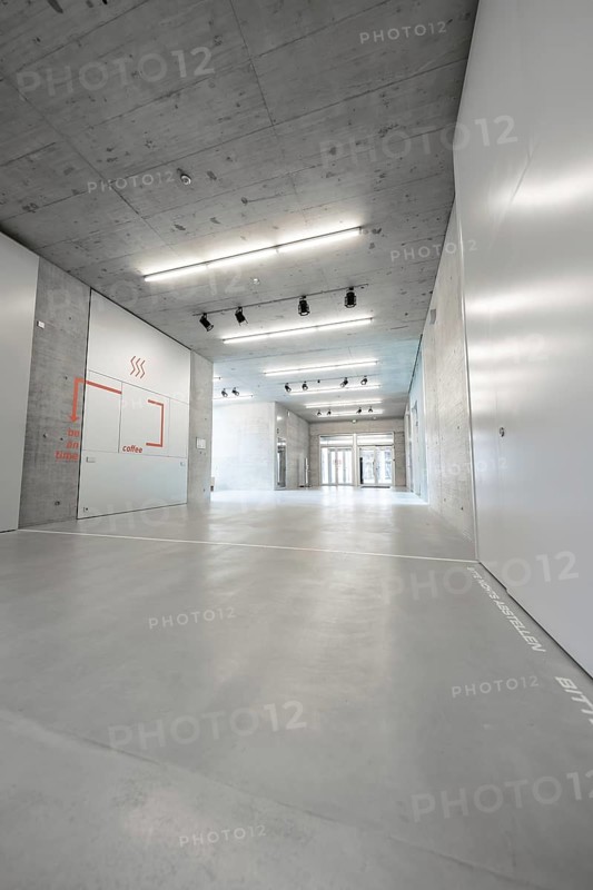Minimalist, empty concrete interior with modern ceiling lighting, University of Stuttgart, Germany, Europe