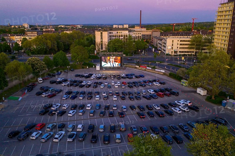 Temporary drive-in cinema, in the car park in front of Messe Essen, Grugahalle, large LED screen, in the Rüttenscheid district, effects of the corona crisis in Germany
