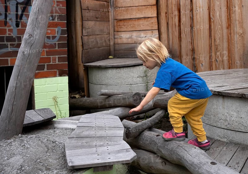 Little girl, 3 years, blonde, gymnastics, playing, adventure playground, playground, Stuttgart, Baden-Württemberg, Germany, Europe
