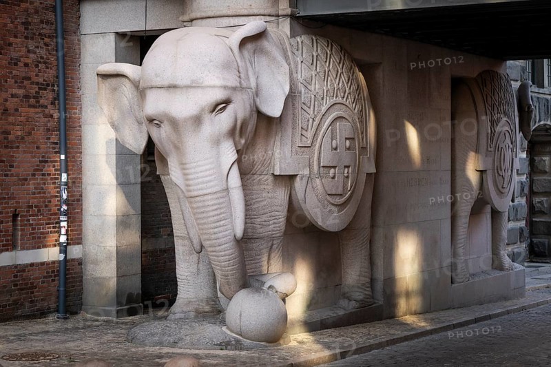 Monumental stone elephant with Indian swastika, elephant gate or elephant portal or elephant portals, designed by architect Vilhelm Dahlerup, Carlsberg district, Copenhagen, Denmark, Europe