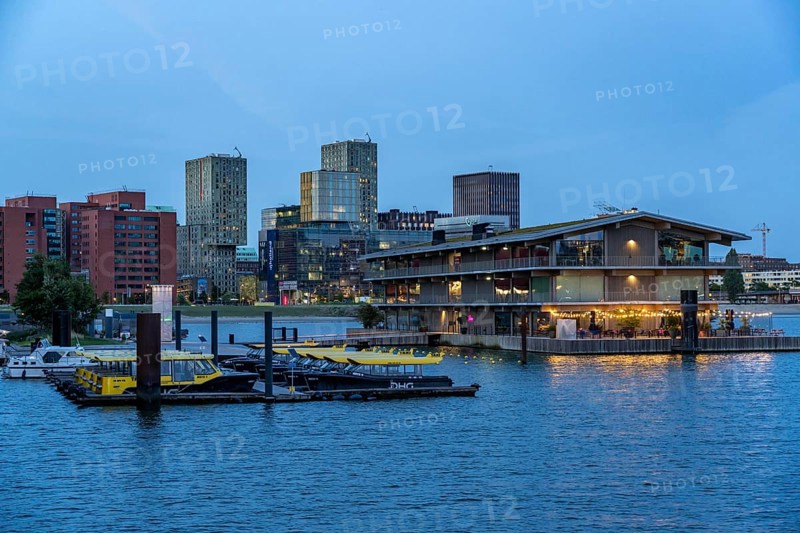 The Floating Office Rotterdam, is considered the world's largest floating office building, jetty for water taxis, in the Rijnhaven, 28ha harbour basin, has now been filled in by almost a third to create space for up to 3000 flats, there will be an artificial beach, a floating park connected by jetties, restaurants and shops, cultural facilities, a major urban development project in the old harbour, the Rijnhaven borders on the popular districts of Kop van Zuid and Katendrecht, Rotterdam, Netherlands