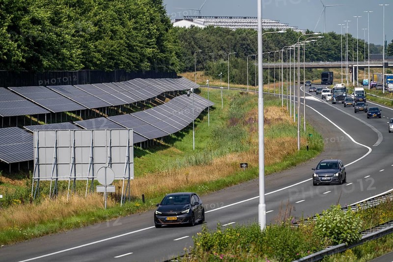 A58 motorway, photovoltaic systems were installed on the slopes to the side of the carriageway, use of the areas along the roads as a solar park, near Etten-Leur, Noord-Brabant, Netherlands