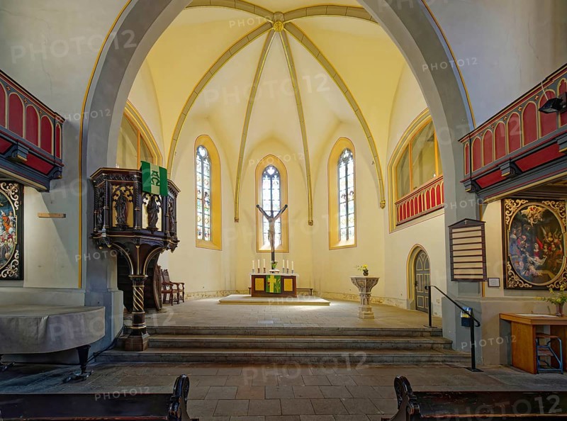 Pulpit, altar, crucifix and baptismal font, late Gothic Protestant-Lutheran town church of St Peter, interior view, market square, old town centre of Eisenberg, Saale-Holzland district, Thuringia, Germany, Europe