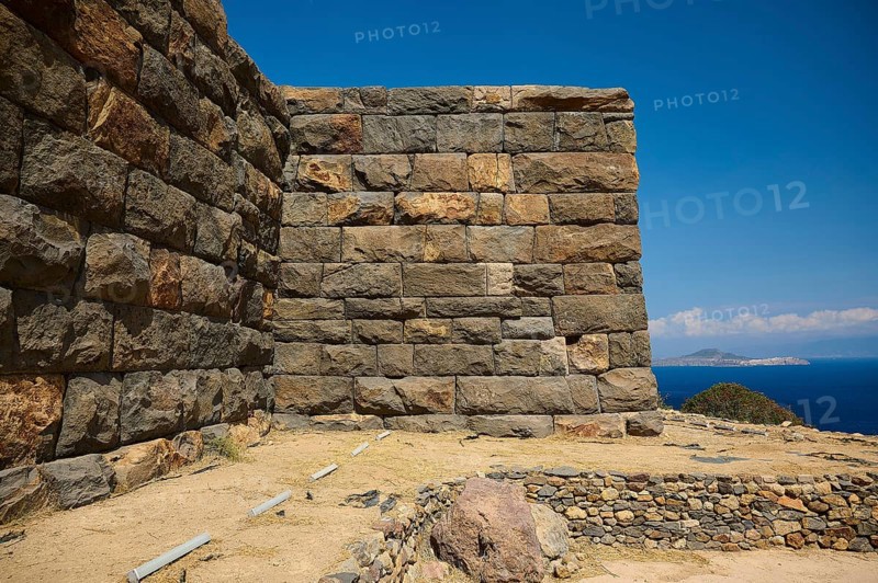 Stone walls of an ancient ruin overlooking the sea under a clear sky, Palaiokastro, Ancient fortress, 3rd and 4th century BC, above Mandraki, Nisyros, Dodecanese, Greek Islands, Greece, Europe
