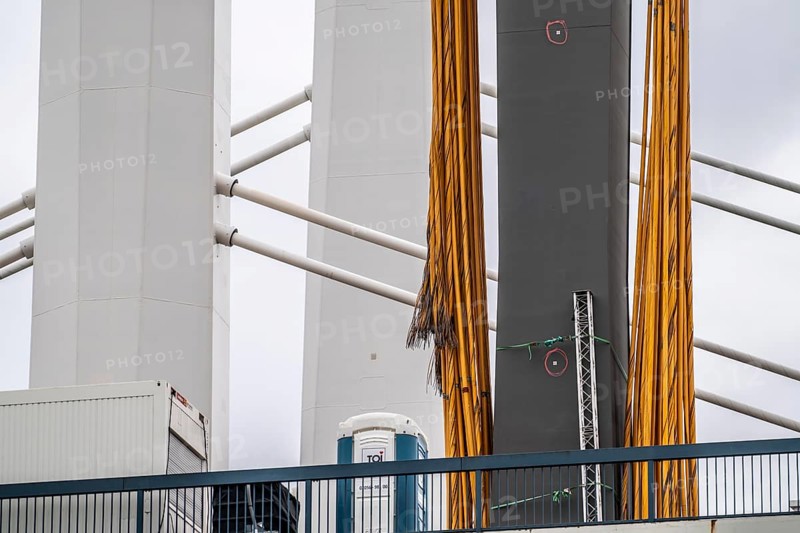 Demolition of the old A40 Rhine bridge Neuenkamp, next to it the first part of the new motorway bridge over the Rhine near Duisburg, severed suspension cables, after dismantling the second part of the new bridge will be built here, Duisburg, North Rhine-Westphalia, Germany, Europe