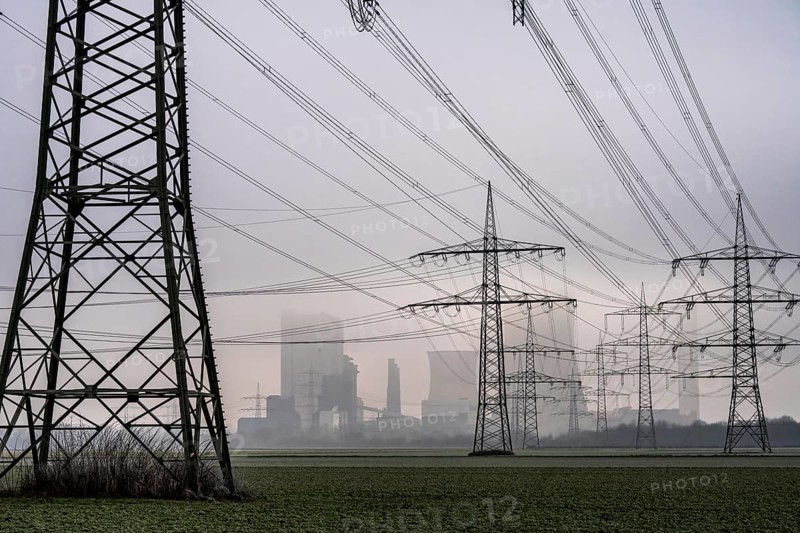 Large power line, 380 KV extra-high voltage lines, near Rommerskirchen, RWE lignite-fired power station Niederaußem in the fog, North Rhine-Westphalia, Germany, Europe