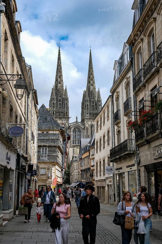 Quimper, Brittany, France - Quimper, Kemper in Breton, is the capital of the historic Cornouaille region in Brittany and the seat of the prefecture of the Département Finistère. Old town with half-timbered houses and the Saint-Corentin cathedral at the back