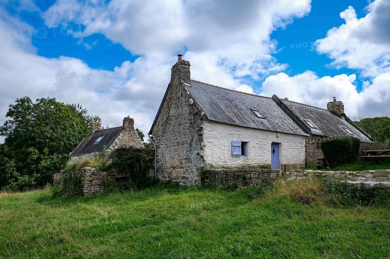 Douarnenez, Brittany, France - Above the picturesque harbour town of Douarnenez and along the cliffs stretches the Plomarc'h nature park, a village with typical Breton houses from the 18th century