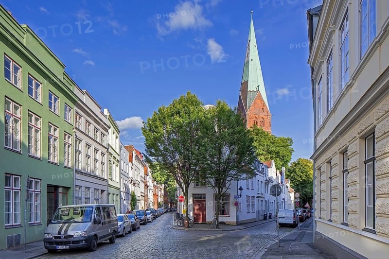 Houses in street Weberstrasse, Weberstraße and St. -Aegidien-Kirche, Aegidienkirche in the city Lübeck, Luebeck, Schleswig-Holstein, Germany, Europe