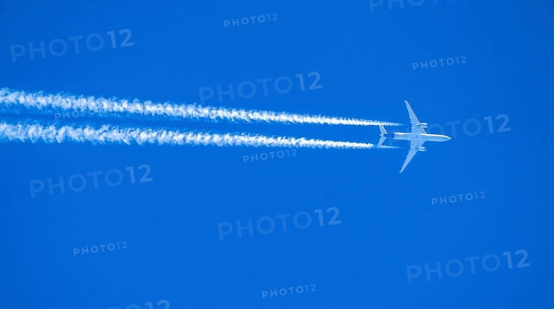 Airbus A350 aircraft in the sky, contrails, Lufthansa flight from Los Angeles to Munich, overflight in Cologne, altitude 39, 000 ft, Germany, Europe