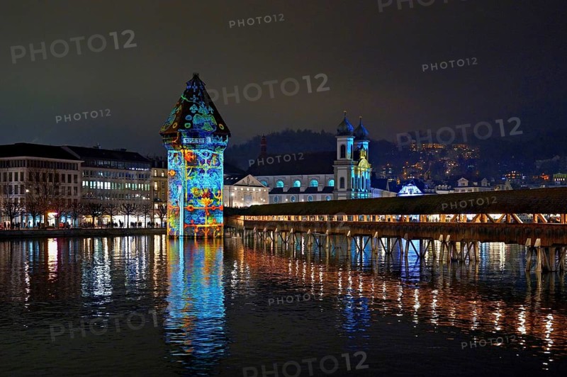 Wassertum with light installation, Chapel Bridge on the right, Jesuit Church on the Reuss at dusk behind, Old Town, Lilu, Light Festival 2025, Lucerne, Canton of Lucerne, Switzerland, Europe