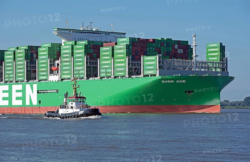 Europe Germany Hanseatic City of Hamburg Harbour, Elbe, shipping company of Evergreen Line, megamax container ship Ever Ace 24, 000 TEU on its way to Hamburg, tugboat Bugsier 18 on the ship, Federal Republic of Germany